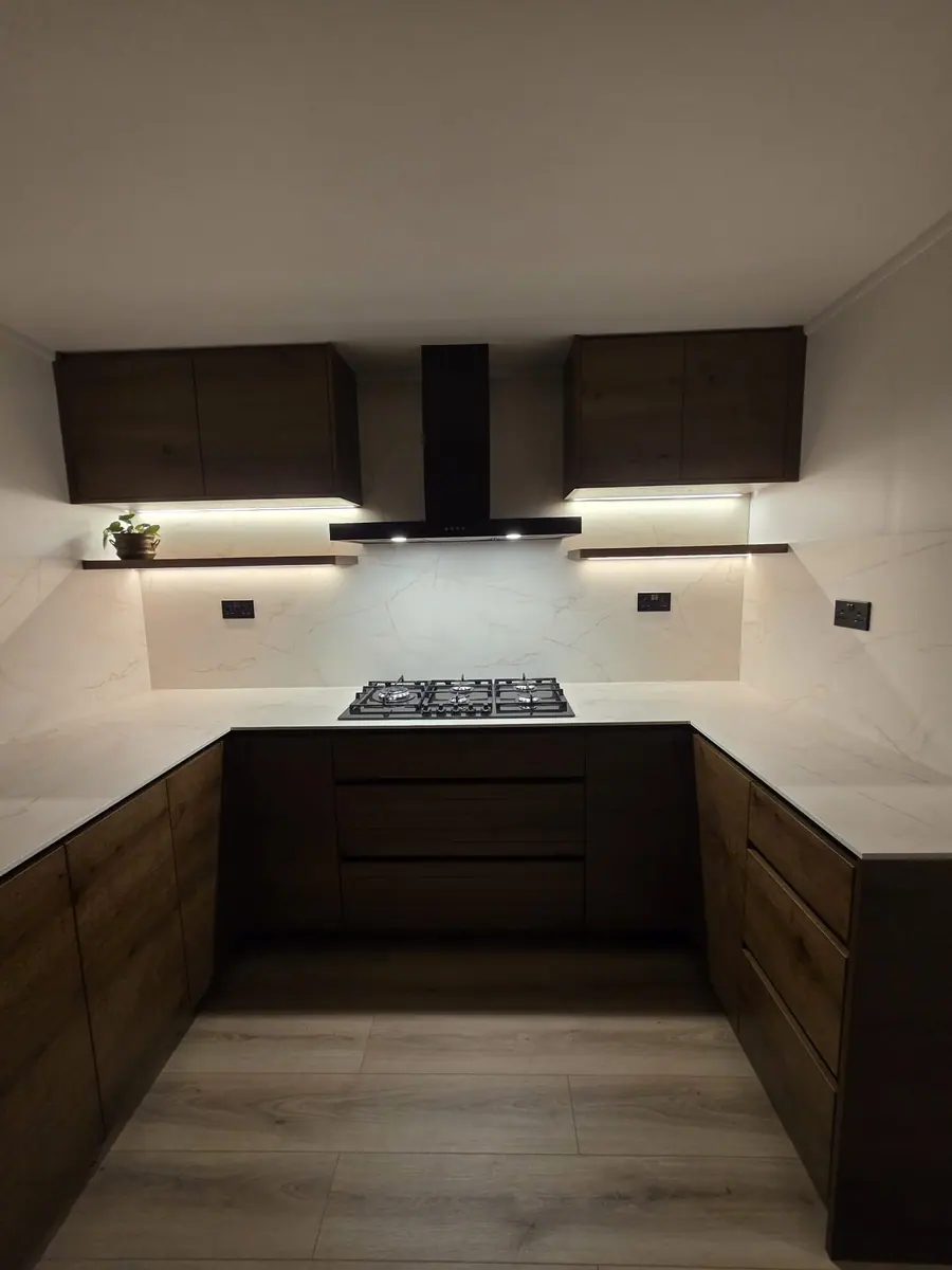 Dark oak kitchen doors with a black extractor