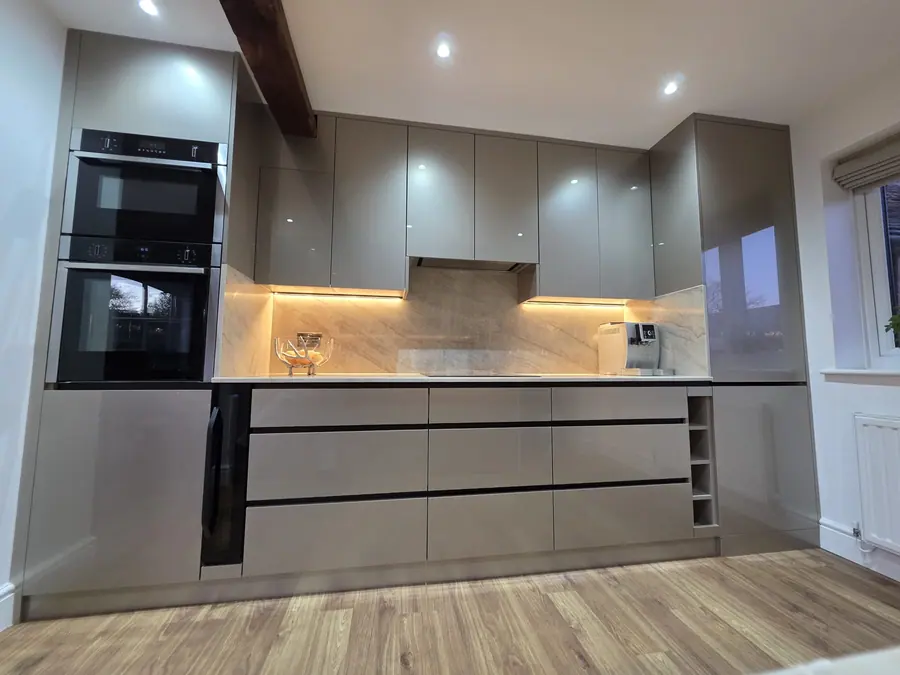 Taupe gloss handleless kitchen